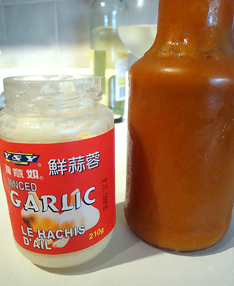 Pre-chopped garlic and homemade ketchup.